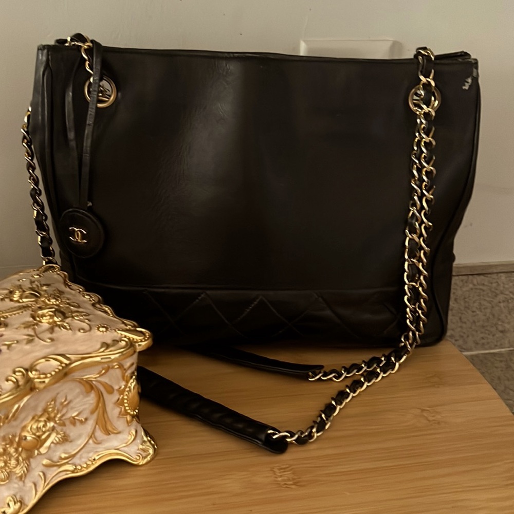 Authentic CHANEL black lamb leather handbag